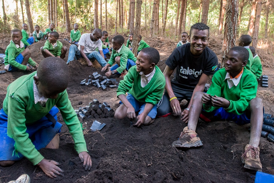 Planting with local children