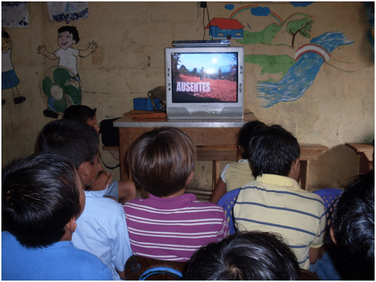 Children watching the video