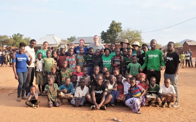 Volunteer Manager/GLIDE employee Joe with his team of Raleigh venturers and children in Matanga