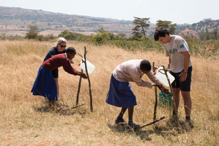 Ryan demonstrates a tippy tap in Tanzania