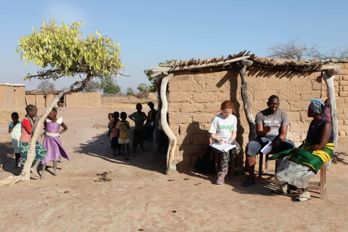 Volunteers interview a local woman in Tanzania