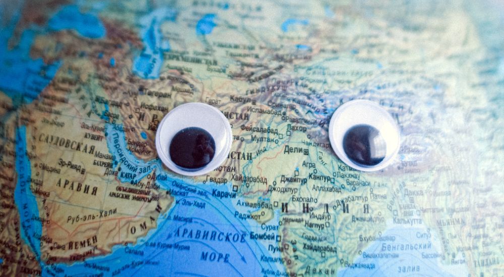 world globe with sticker eyes