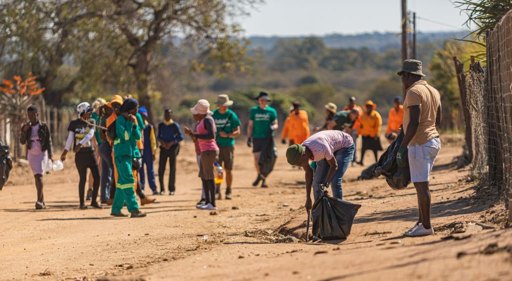 volunteers and locals picking trash
