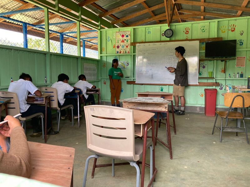 Volunteer teaching in a classroom