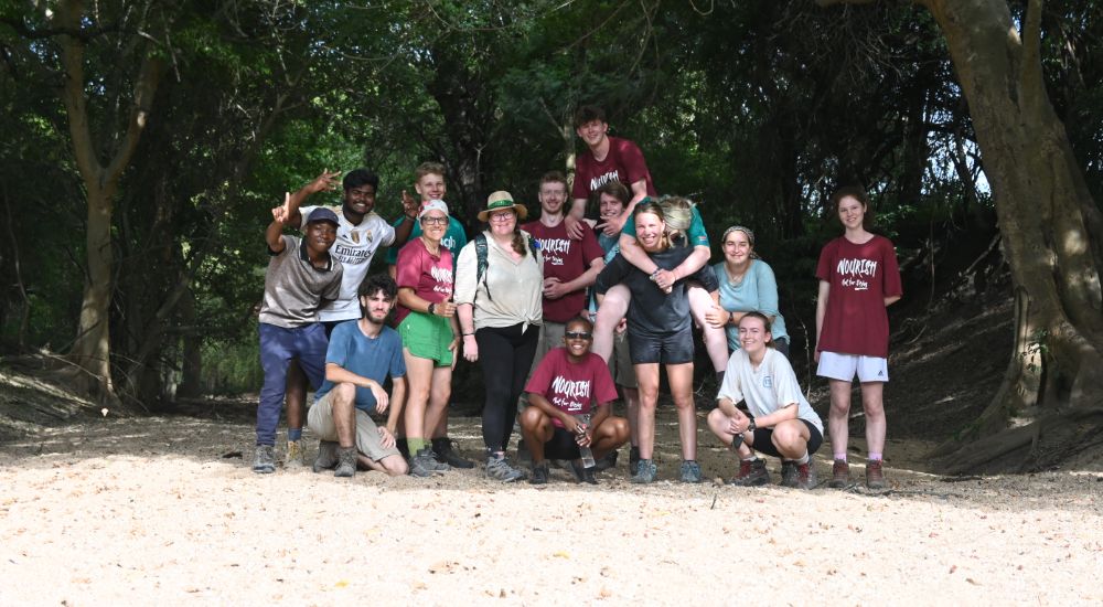 Raleigh Volunteers posing together for a group photo.