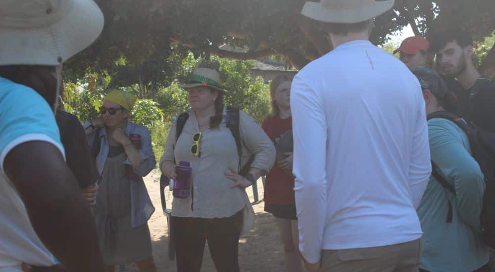 Raleigh Volunteers gathered together, engaged in conversation.