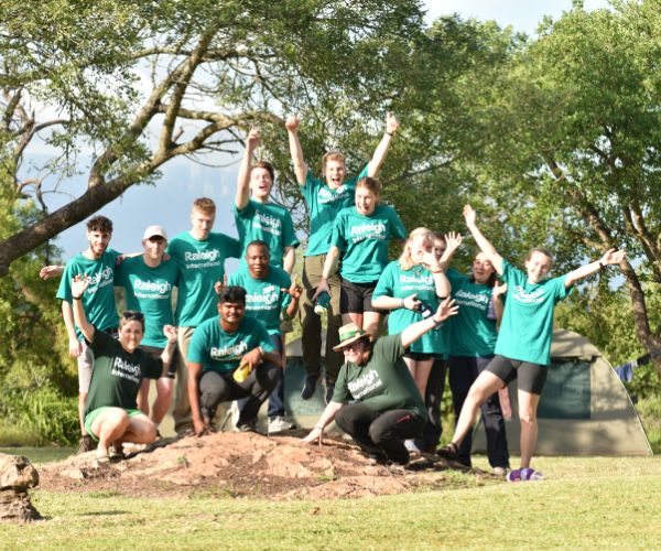 Raleigh Volunteers posing happily for a photo.