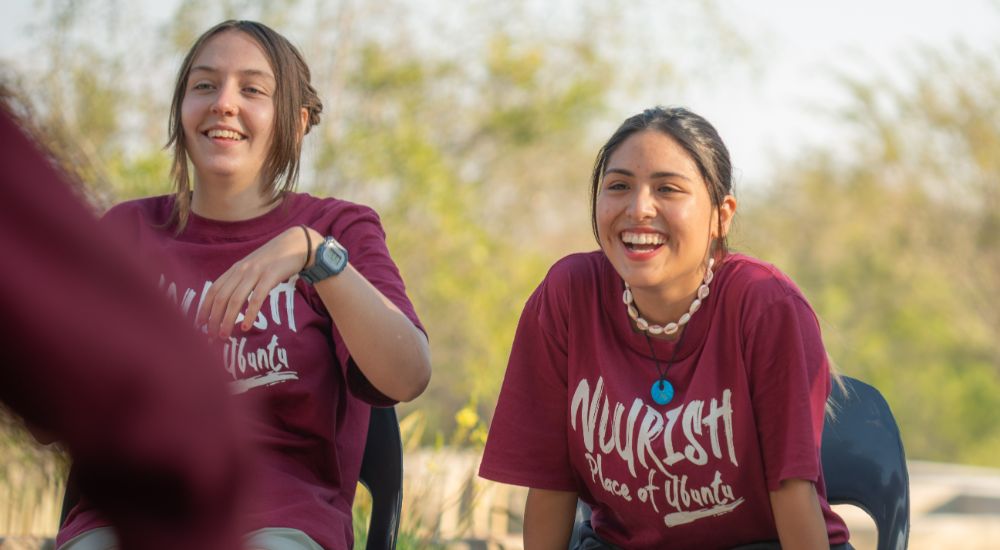 Two Raleigh volunteers looking very happy.