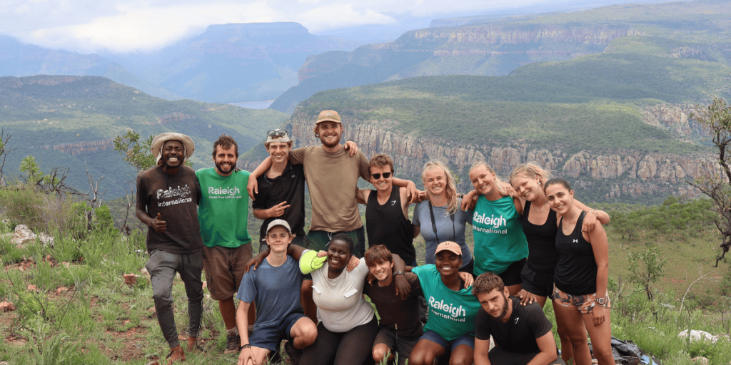 Raleigh International our blog Raleigh team with view in South Africa after trekking
