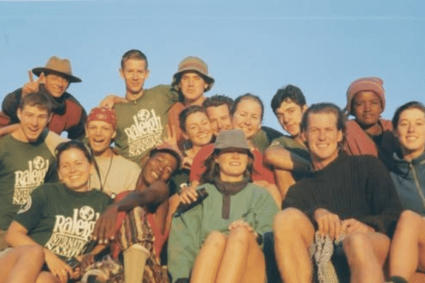 Raleigh-International-Alumni-group-posing-sat-together.