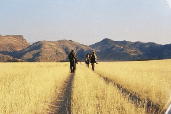 Raleigh-International-Alumni-trekking-with-mountain-background